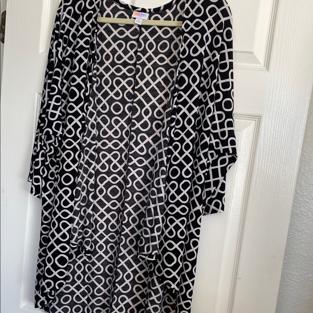 Like new LuLaRoe Lindsay Black and White Geometric Patterned Cardigan